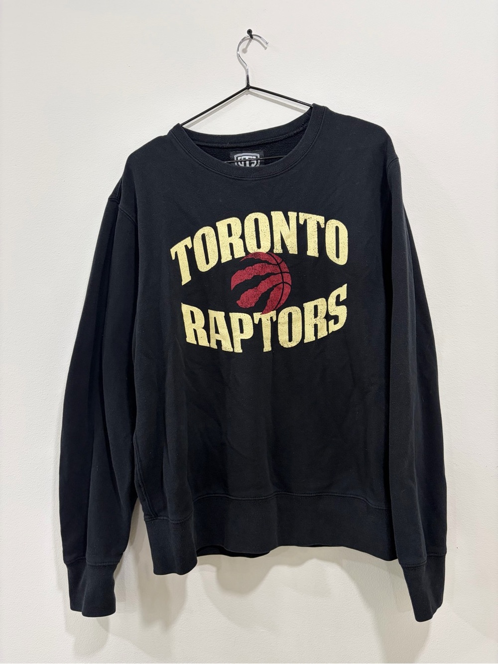 Toronto Raptors Black Crewneck Sweatshirt with Cream Lettering